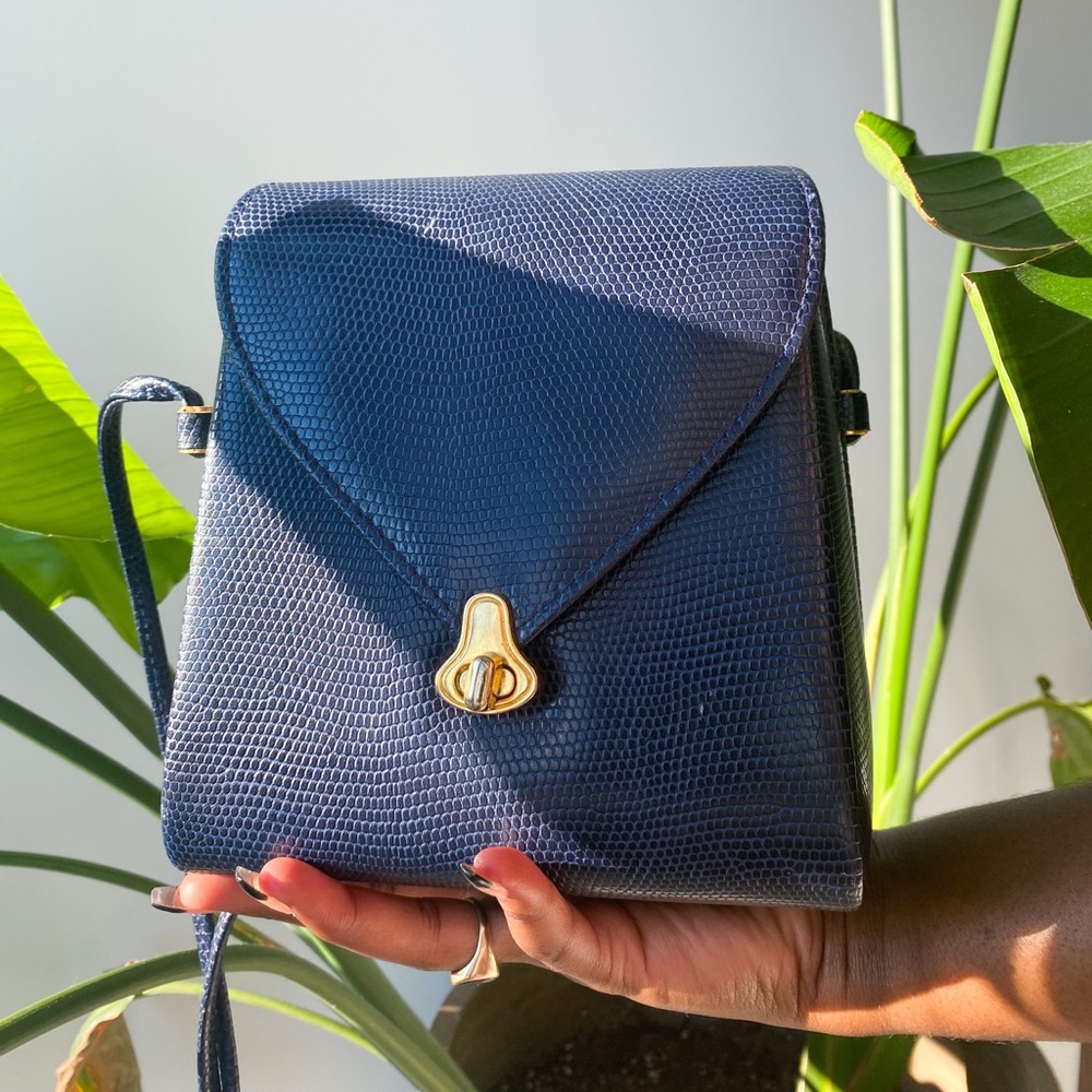 Navy blue snakeskin crossbody clamshell bag